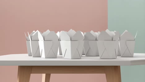 collection of blank white take-out boxes on a table