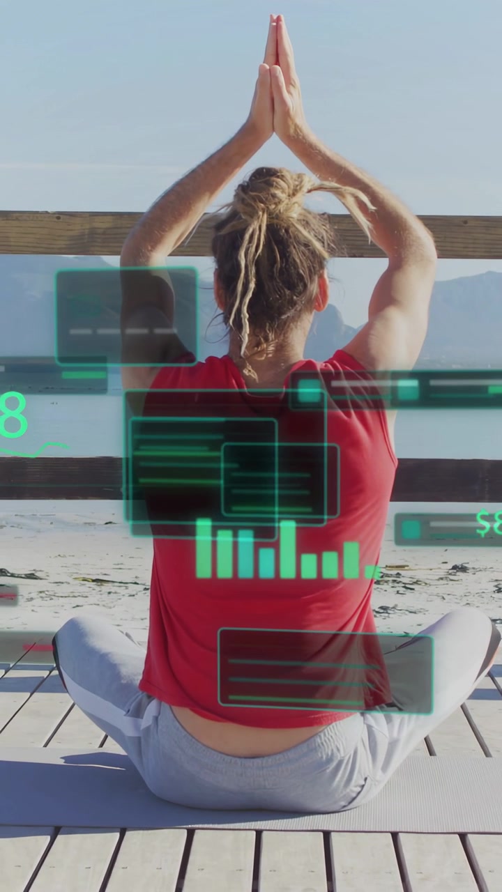 Vertical video: Woman seated on yoga mat, lowering arms after prayer pose, HUD guiding fitness