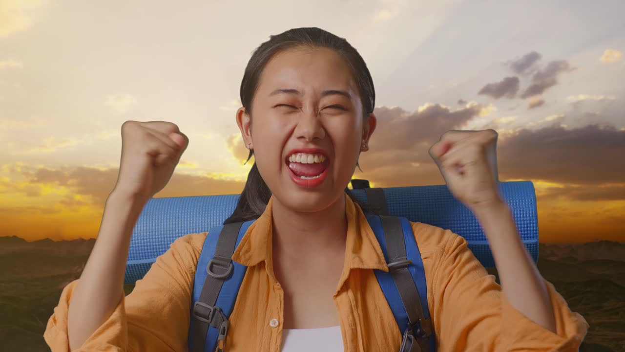 Happy Woman Celebrating Hiking Trip