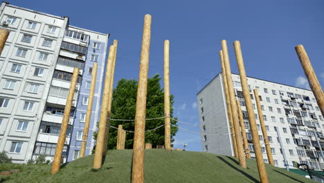 wooden play structure in urban setting