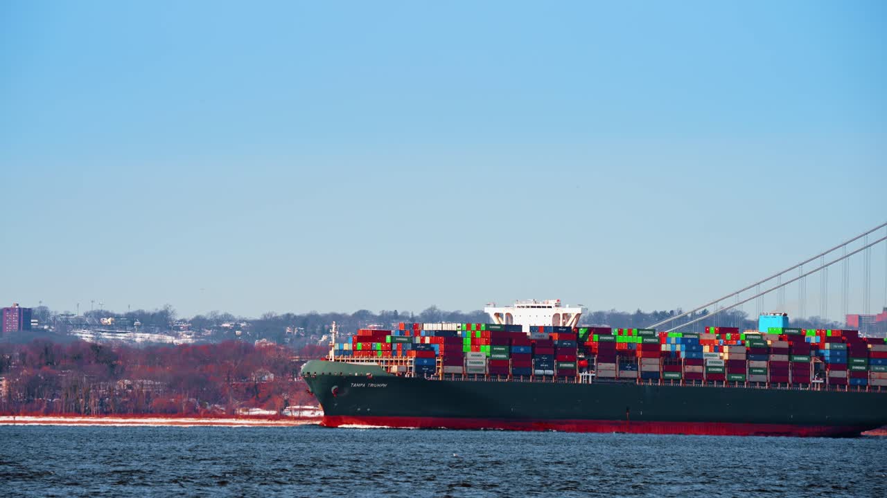 New York, USA, 24 December 2025: Verrazzano Bridge maritime transport. Maritime transport scene at Verrazzano Bridge in New York Harbor