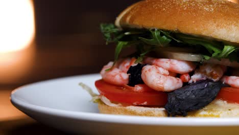 shrimp burger on a plate