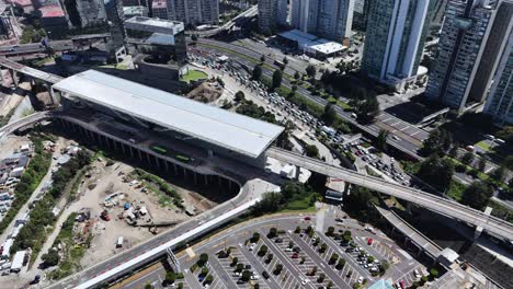 aerial view of a city with a new metro station under construction