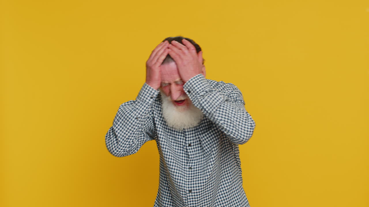 Irritated angry senior old man screams from stress tension problems shock rage nervous quarrel