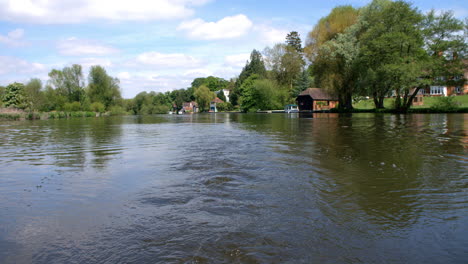 slow motion sequence of river thames viewed from boat