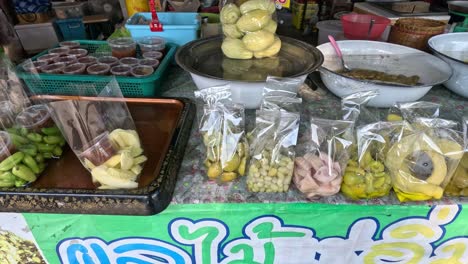 vendor packaging and selling tropical fruit snacks