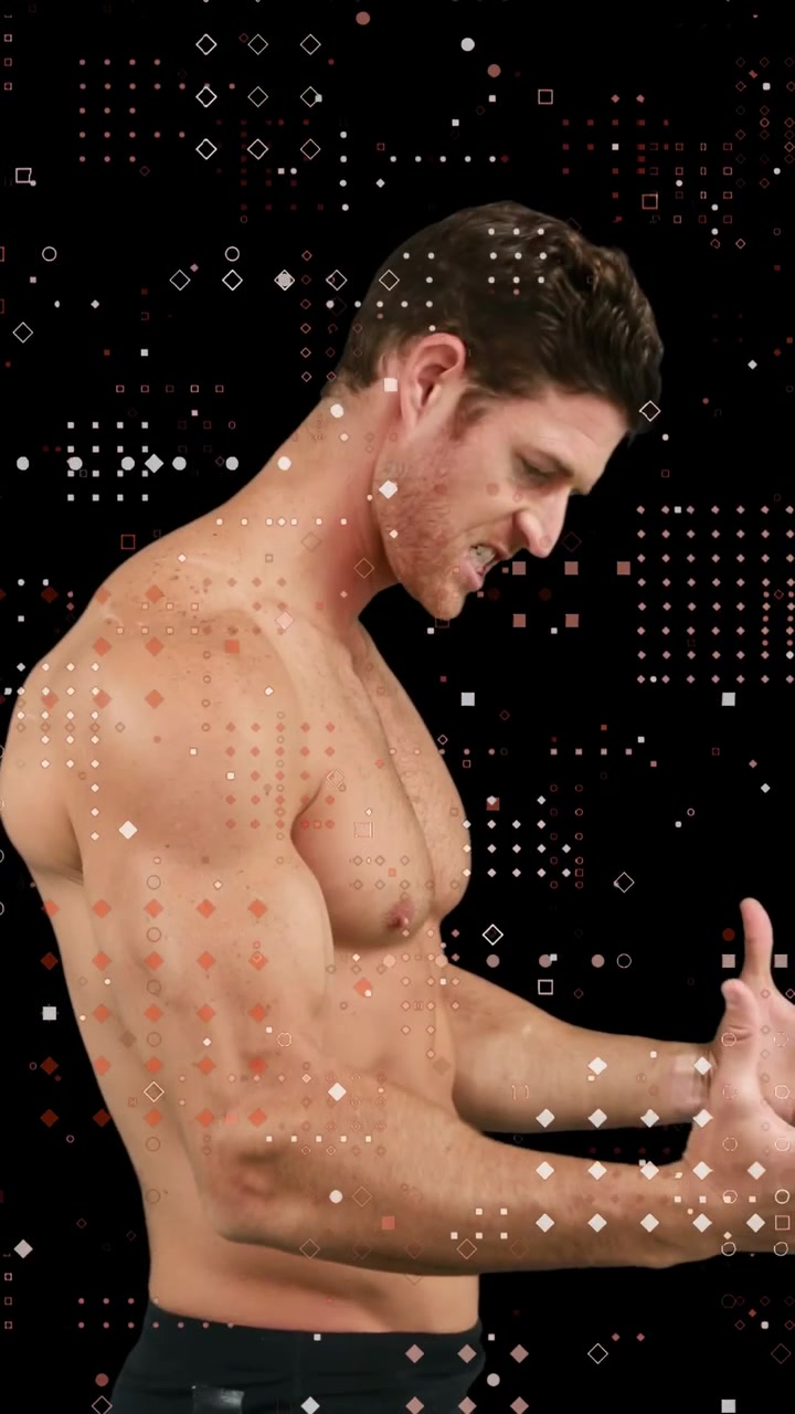 Video verticale: Uomo che sistema i pantaloncini in posa mentre punti pulsanti appaiono e svaniscono intorno a lui, mostrando moda fitness.