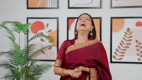 Indian-woman-laughing-while-talking