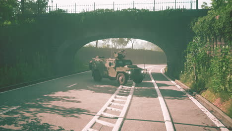 armored military car in big city