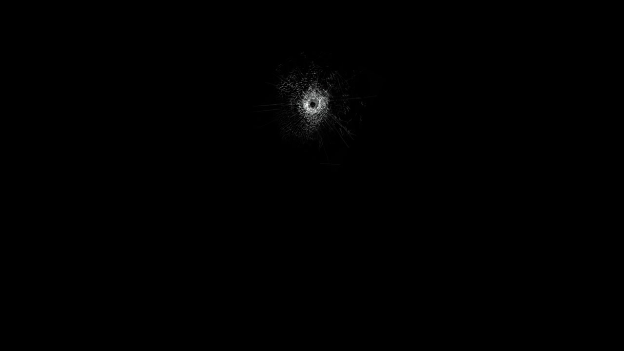 Gunshot hole mirror crack.
