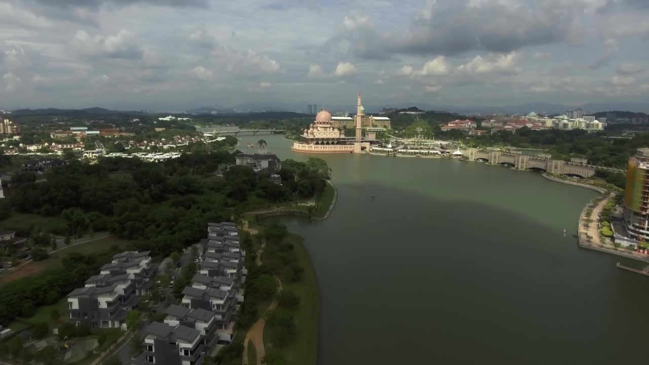 Drone approaching the beautiful Putra Mosque in Putrajaya, Malaysia
