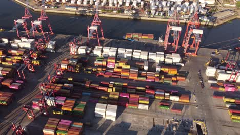 numerous containers and cranes at commercial industrial port of buenos aires, argentina