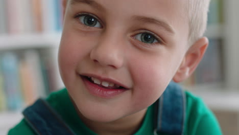portrait happy little boy smiling with natural childhood curiosity looking joyful child with innocent playful expression 4k footage