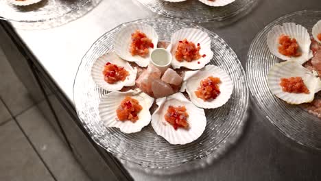 appetizer of seared scallops with salmon salsa