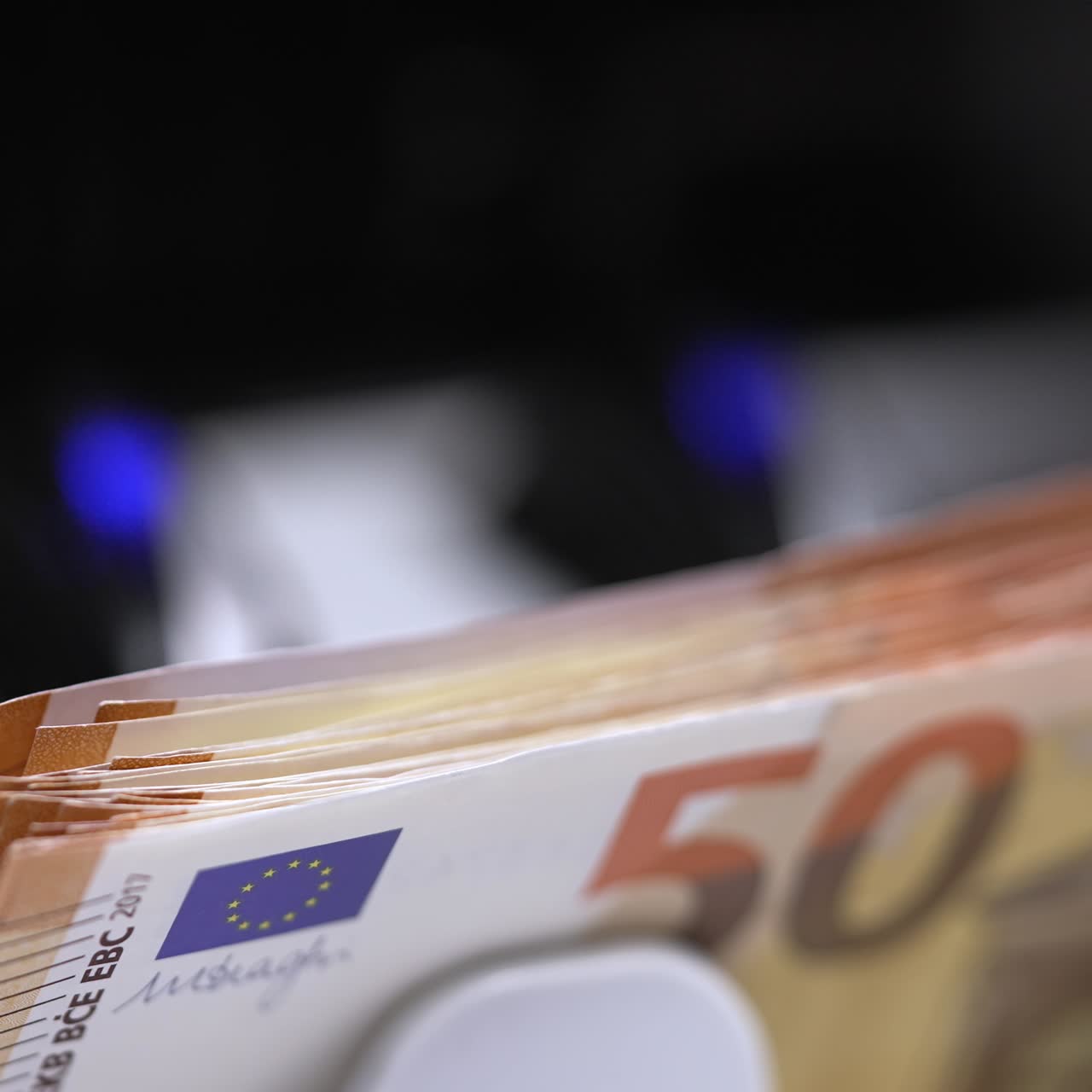 Banking equipment for counting cash. Currency financial banknotes counting on a finance counter