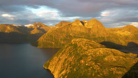 explore the arctic beauty of finnkonakken's golden hour with this high-resolution 4k drone footage. a must-have for creators seeking cinematic views and dramatic scenery. northern norway at its best.