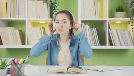 young asian woman receiving negative news from the camera.