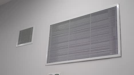white rectangular wall mounted ventilation system