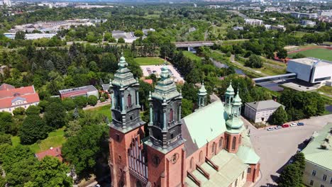 drone of poznań cathedral, stunning descent along its historic spire, poland, 4k