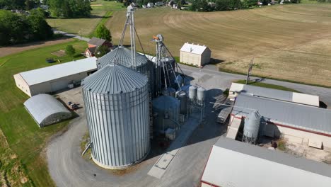 aerial orbit of grain silos and elevator