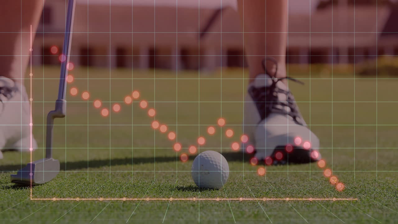 Golfer lining up golf ball on putting green, viewing tech overlay with grid and red graph