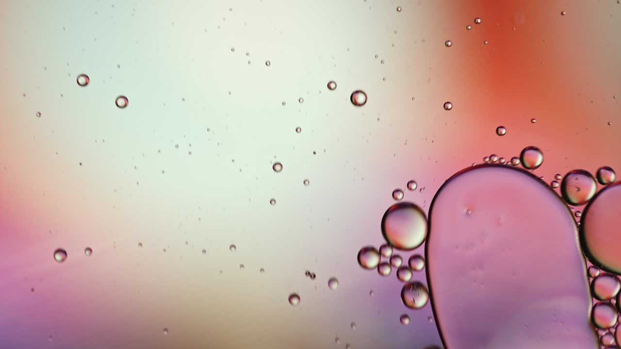 Abstract Colorful Food Oil Drops Bubbles and spheres Flowing