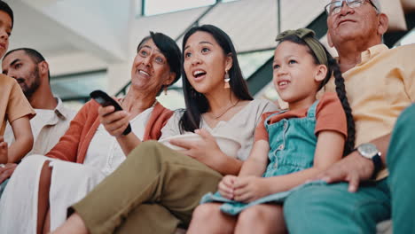 happy family watching tv together