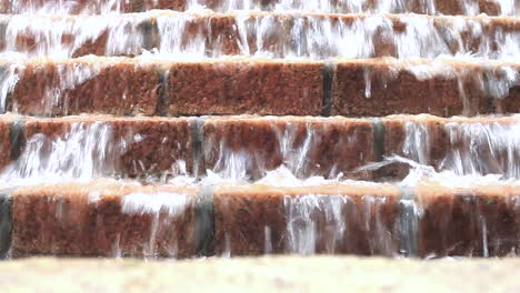 Water-falls-down-in-cascade-fountain