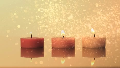 animación de puntos de luz sobre tres velas