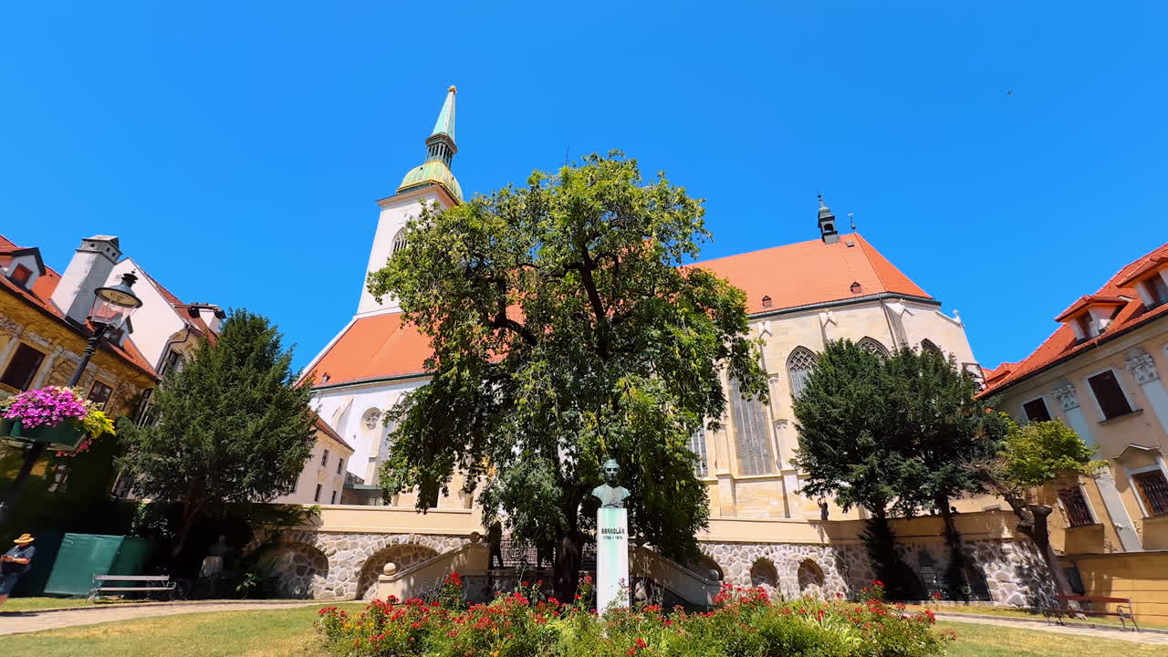 Bratislava, Slovakia, 2 June 2025: Discover st. martin's cathedral. Bright blue skies greet visitors as they admire the historic St. Martin's Cathedral in Bratislava, Slovakia
