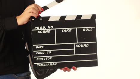clapperboard in hands