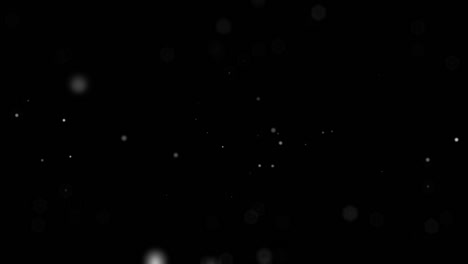 partículas blancas de polvo de nieve que se mueven lentamente en el espacio negro