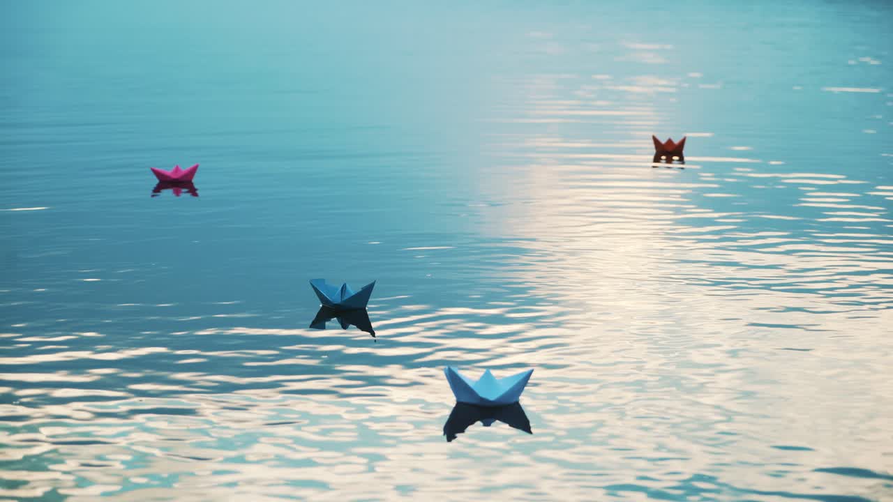 Paper boats floating in the river. Beautiful summer sunset. Origami.