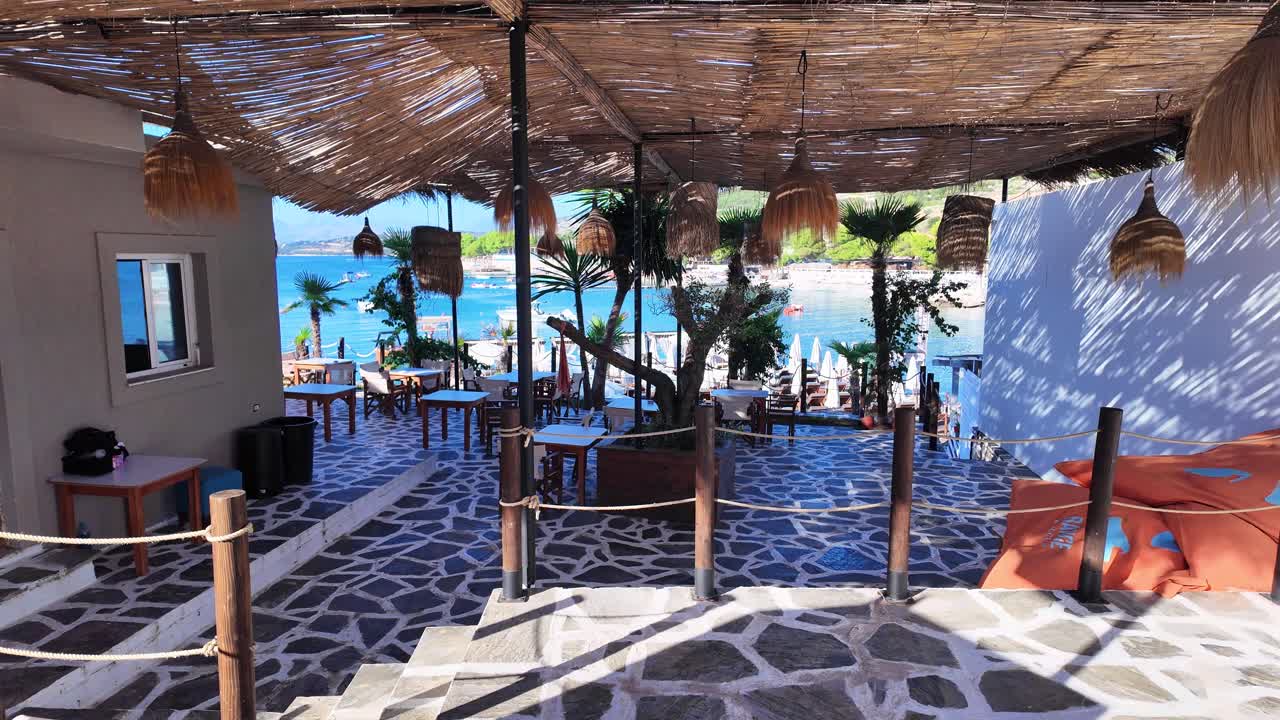 Beach club Ksamil Albania empty during the day party bar village sea view