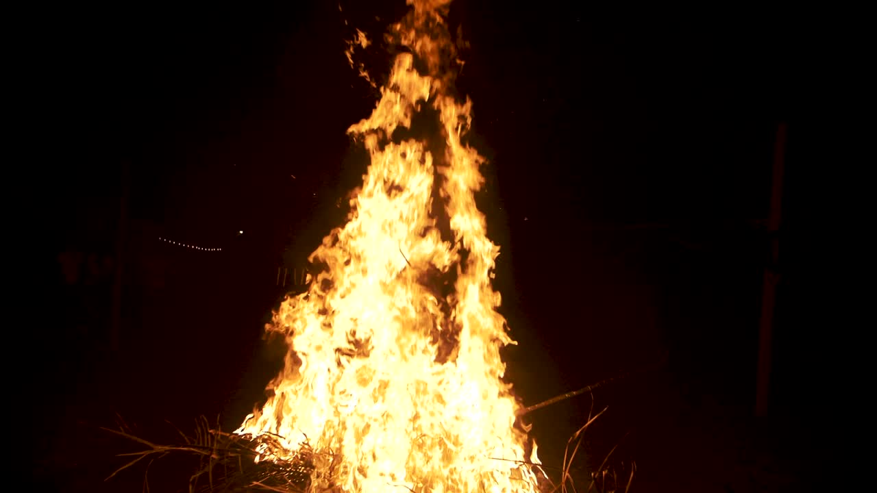 Big fire burning in slow motion at night - 120fps campfire