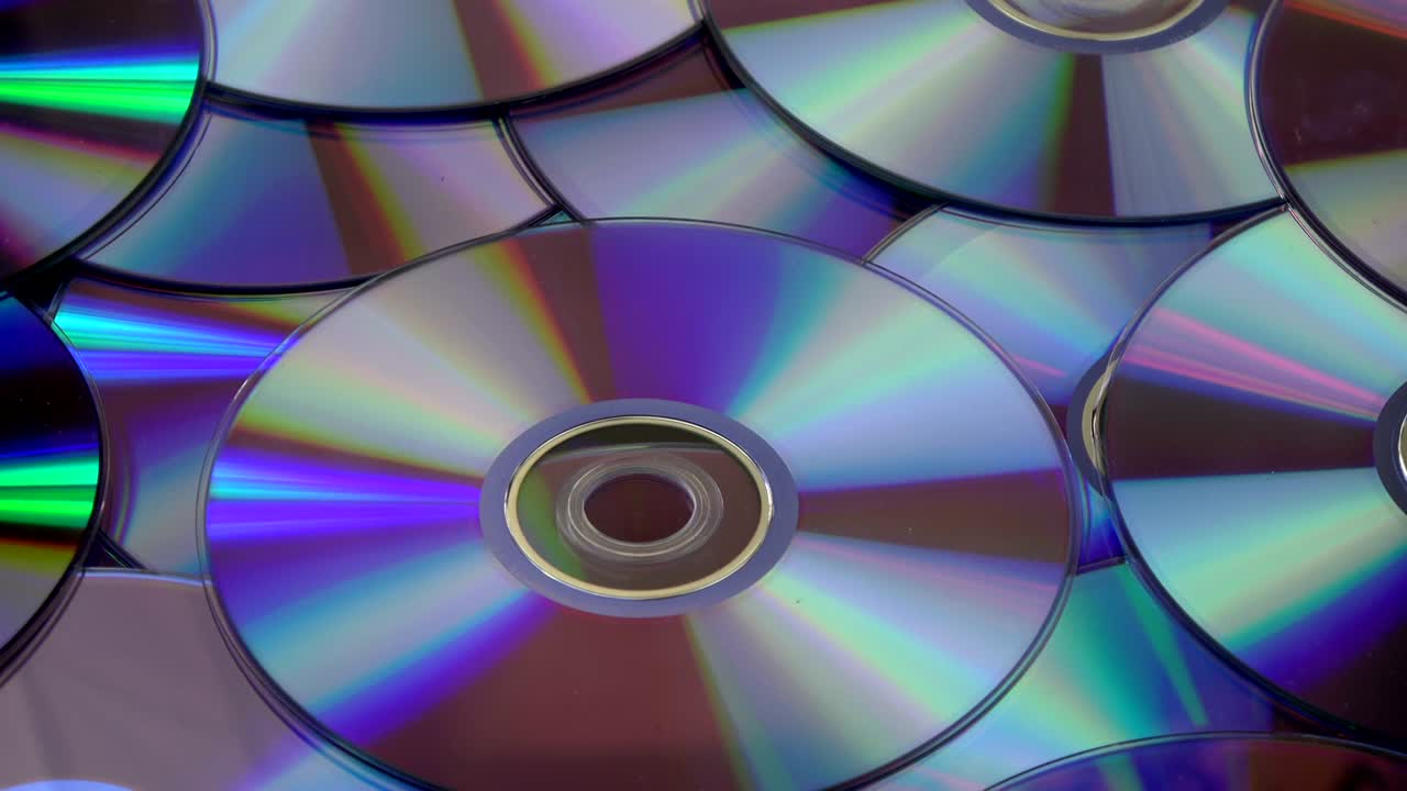 fondo de discos compactos de dvd y cd giratorios