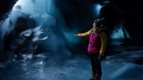 woman exploring a stunning ice cave