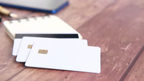 credit cards on a wooden desk