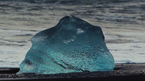 slow motion shots of blue icebergs on diamond beach in iceland