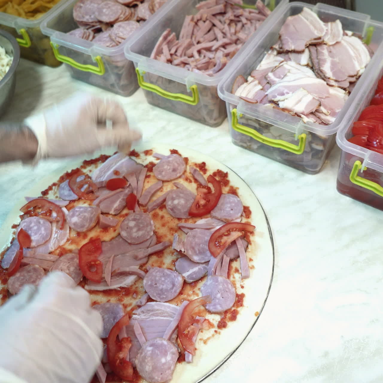 Food ingredients for pizza on table close up. Making a pizza Sqare video