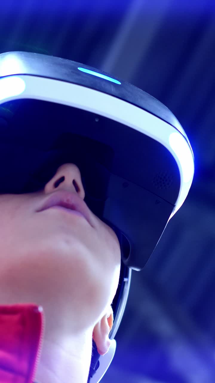 Young person wearing virtual reality headset is immersed in digital experience, showcasing advanced technology and modern gaming culture in a vibrant environment