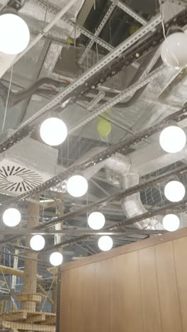 interior view of a building with construction elements, and play area