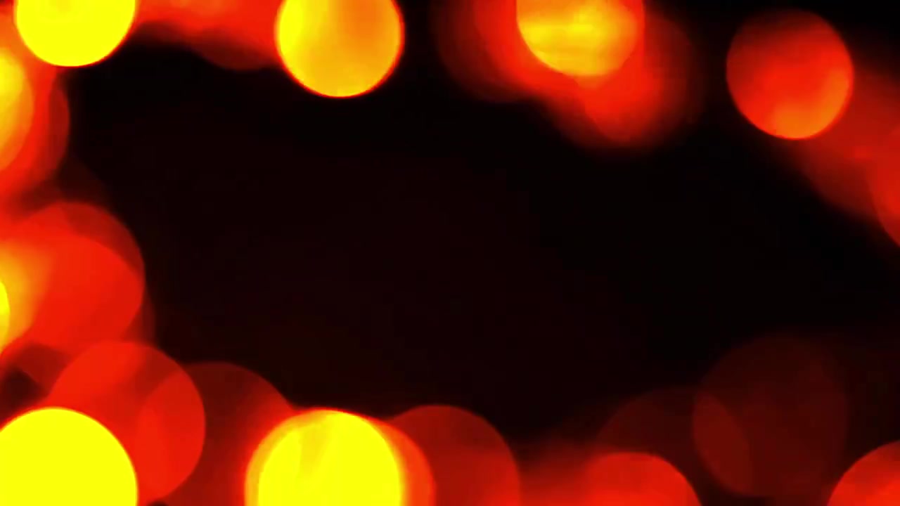 Abstract Background of Glowing Red and Orange Bokeh Lights