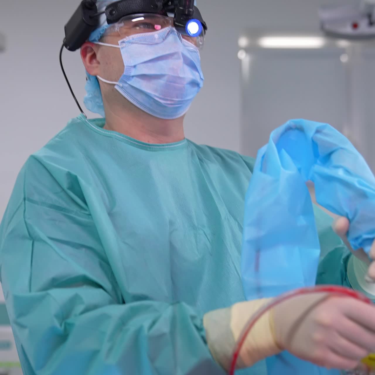 Professional doctor in medical uniform in surgical room. Medical specialist performs nasal surgery in modern hospital. Health care concept