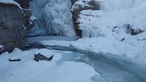 Frozen-waterfall-with-ice-in-winter-tilt-up