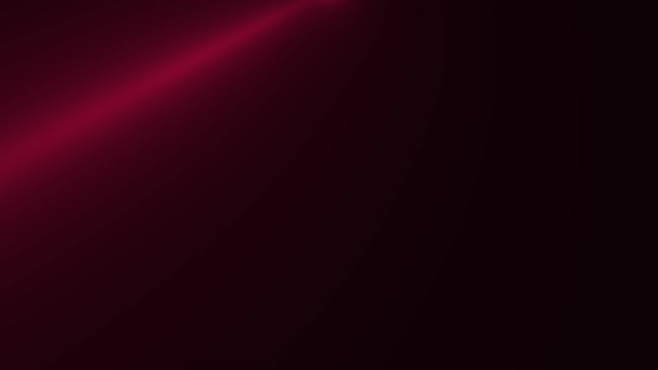Red neon light beams on performance stage