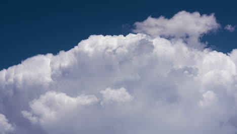 massive clouds against a deep blue sky