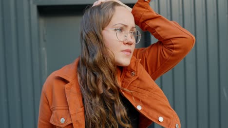 Woman-shakes-hands-clenching-fists-and-pulling-at-hair-confused-and-angry