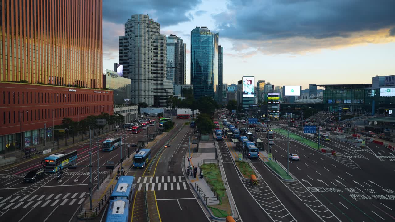 Cars and Buses Traffic Moving at Seoul Station Bus Transfer Center at Sunset - slow motion