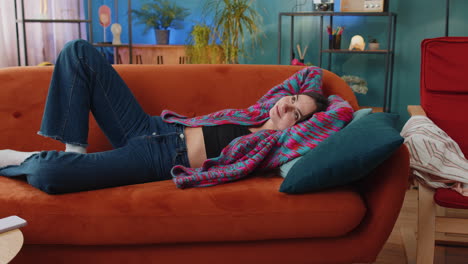 woman relaxing on a couch